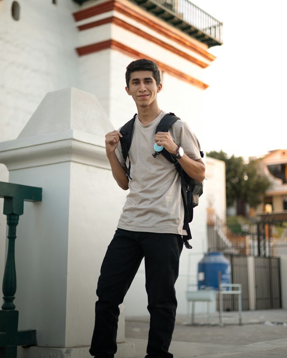 a man standing in front of a building