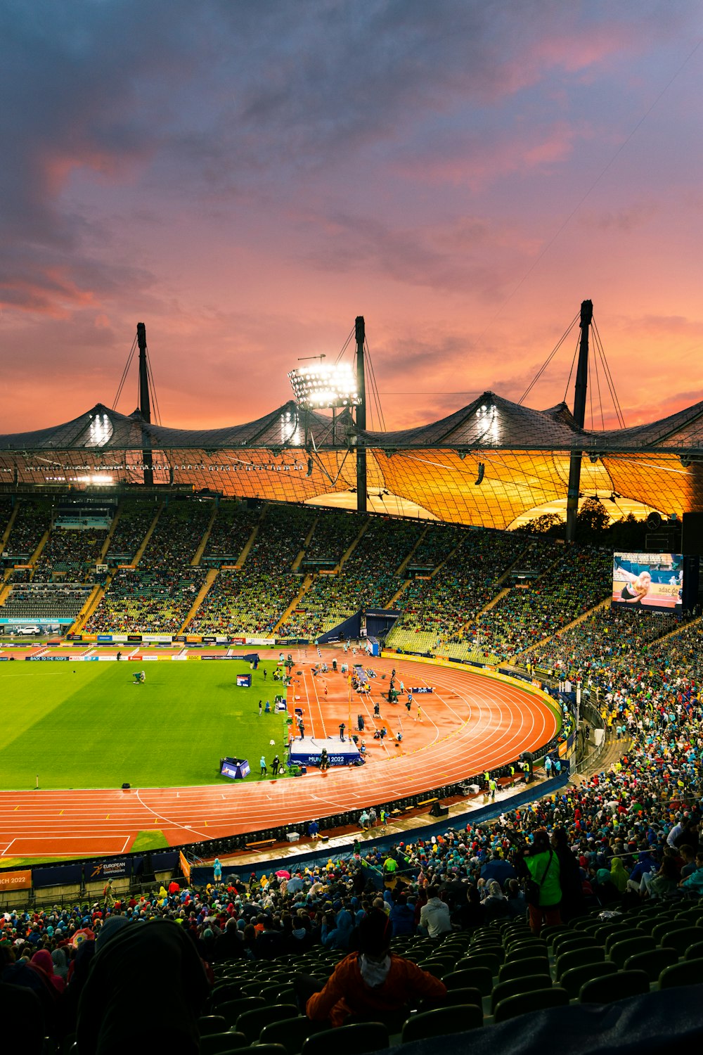 a baseball stadium with a crowd of people in it