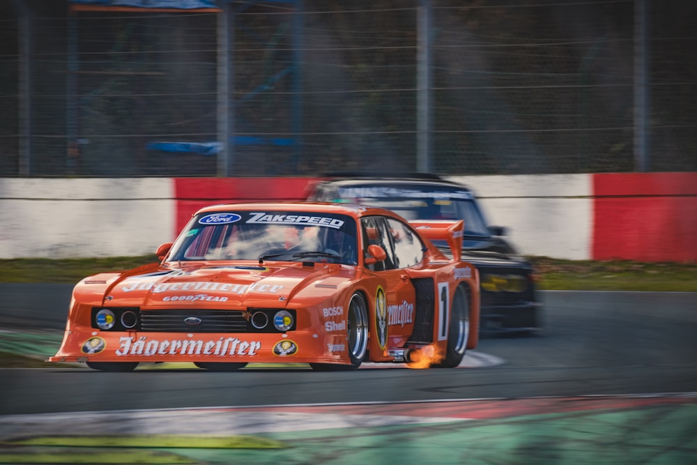 a group of race cars on a track