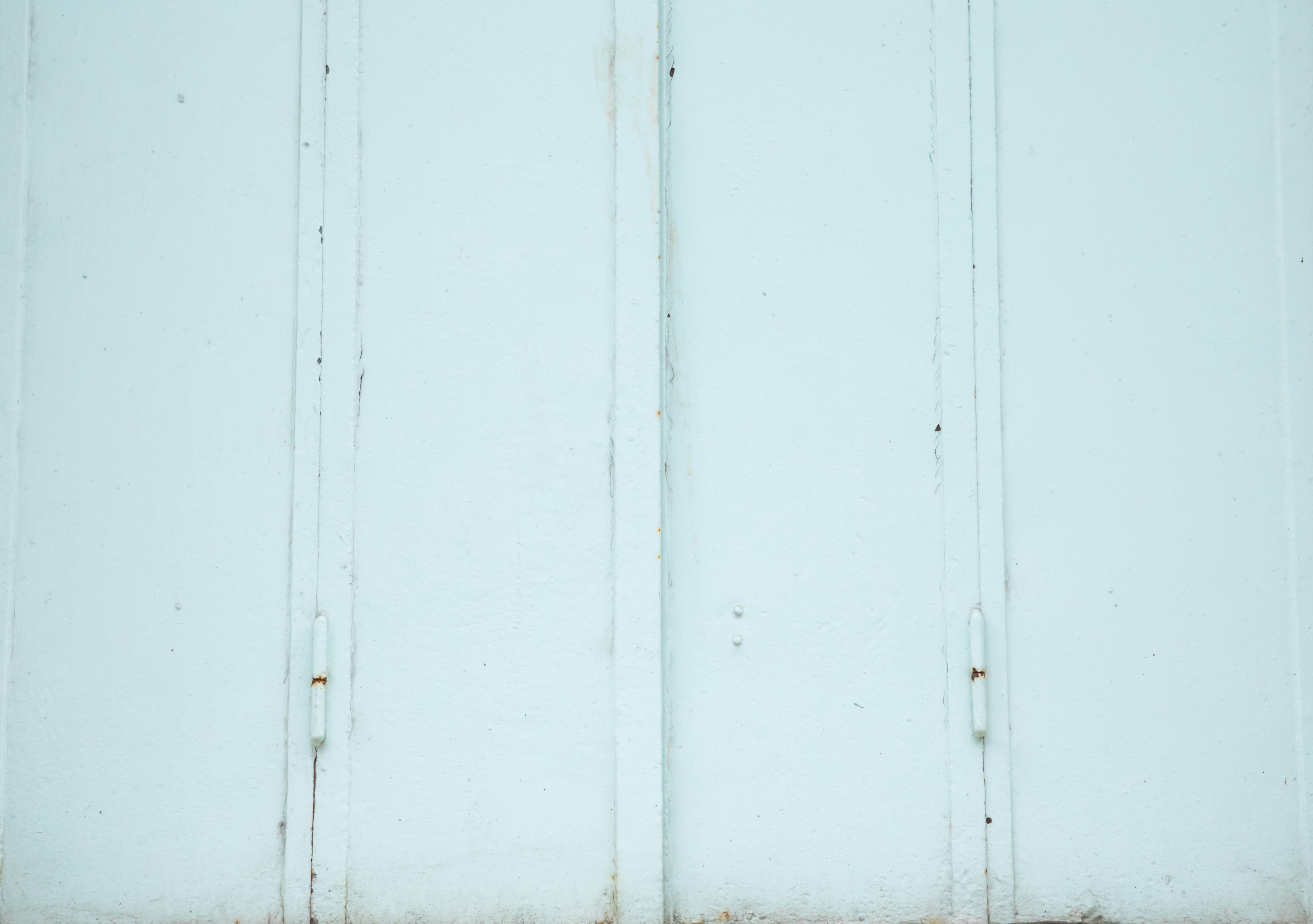 a white wall with a brown line