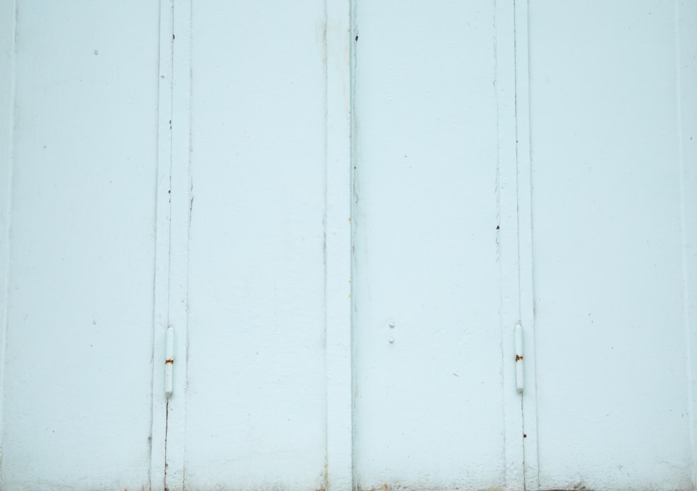 a white wall with a brown line