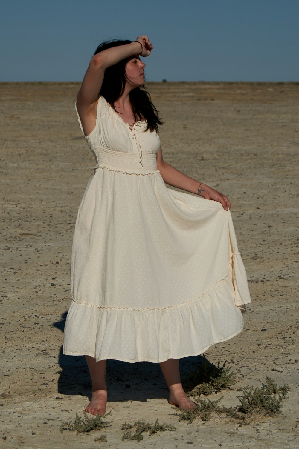 a woman in a white dress