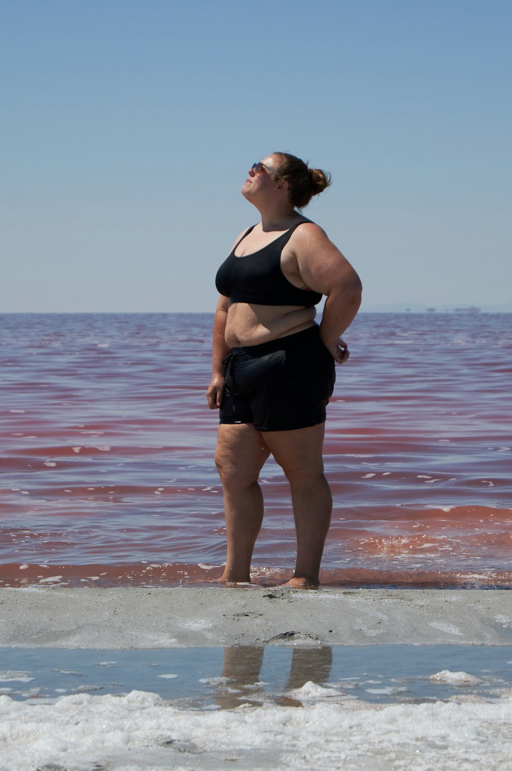 a person standing on a beach