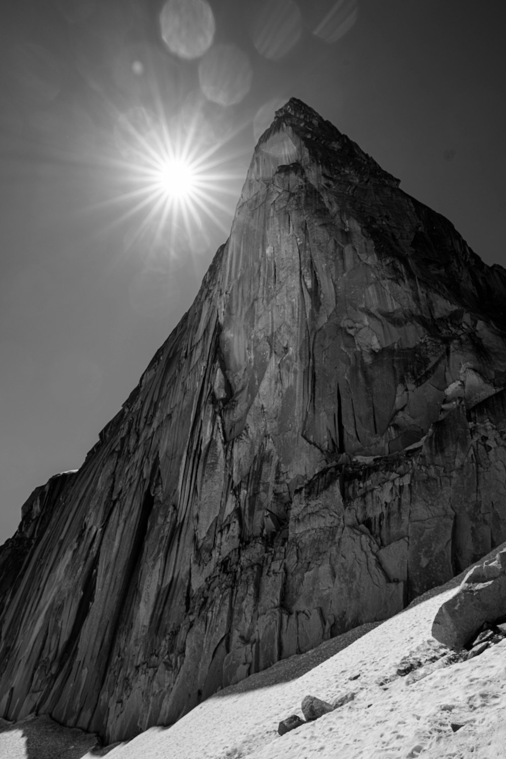 a large rock with a bright light