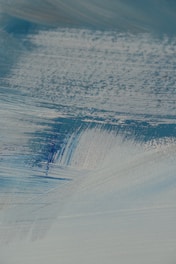 A close-up of textured brushwork on a bespoke art piece.