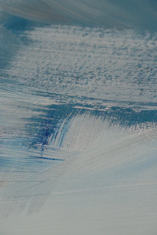 Close-up of textured paint strokes revealing depth and movement on canvas.