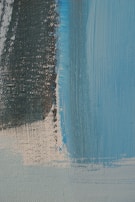 A close-up of textured canvas featuring layered paint strokes.