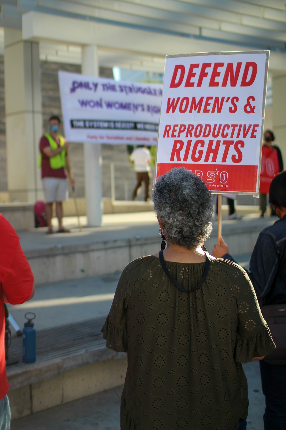 a person holding a sign