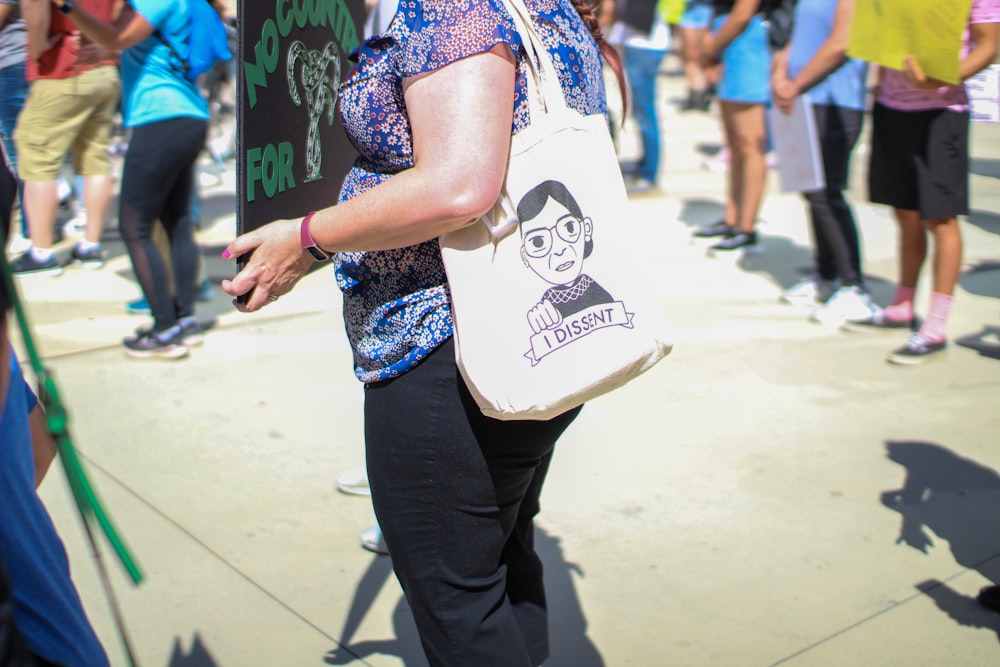 a person holding a sign