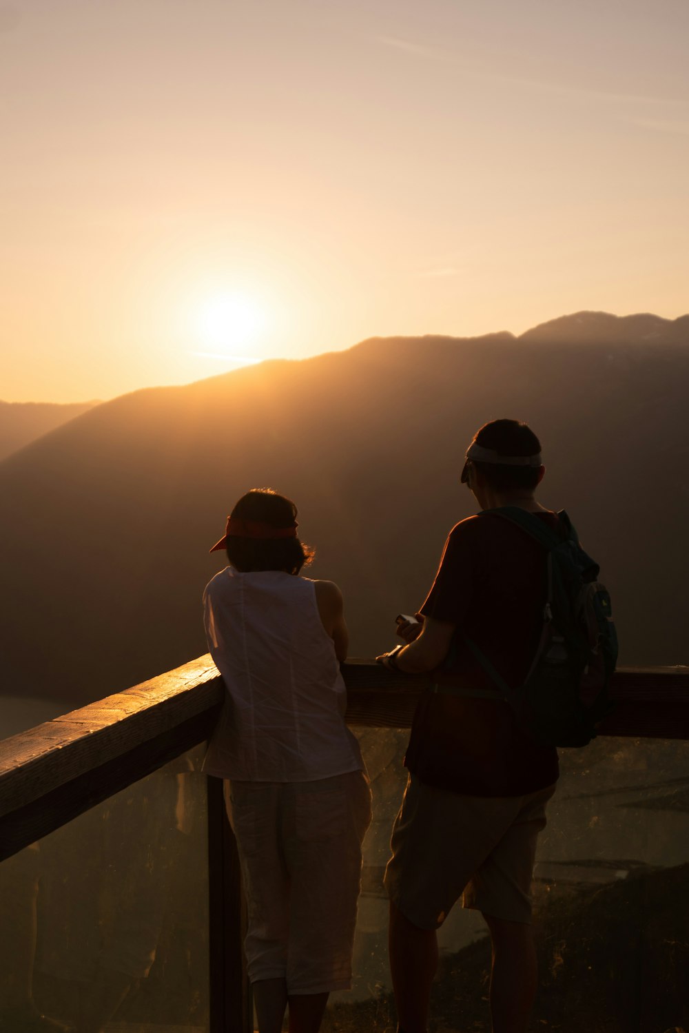 two people looking at the sun