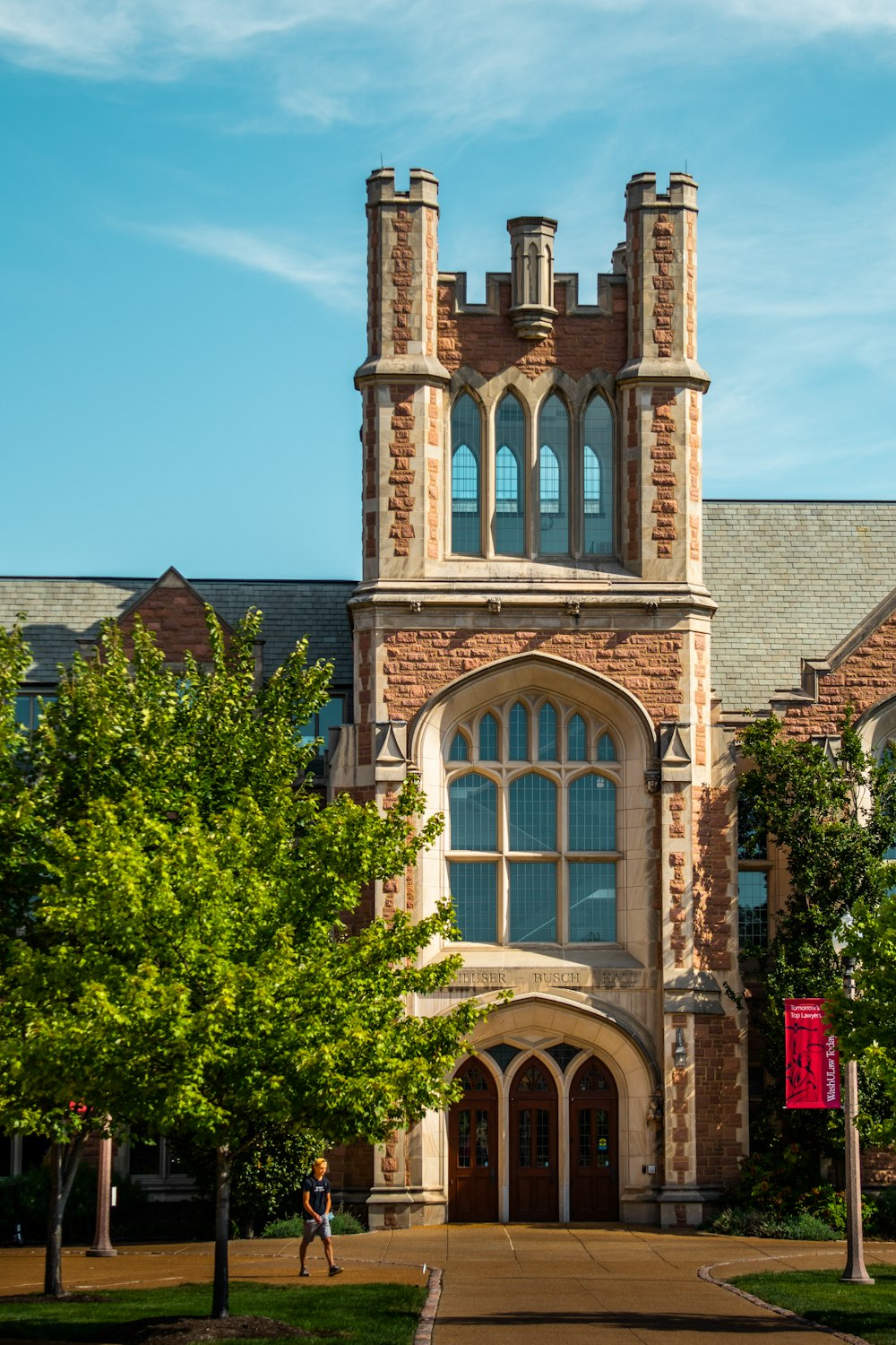 a large brick building with a tower