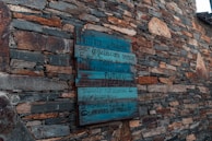 A rustic wooden sign with a charming, weathered look.