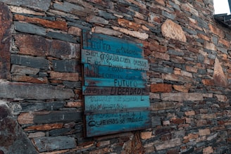 A rustic wooden sign with a charming, weathered look.