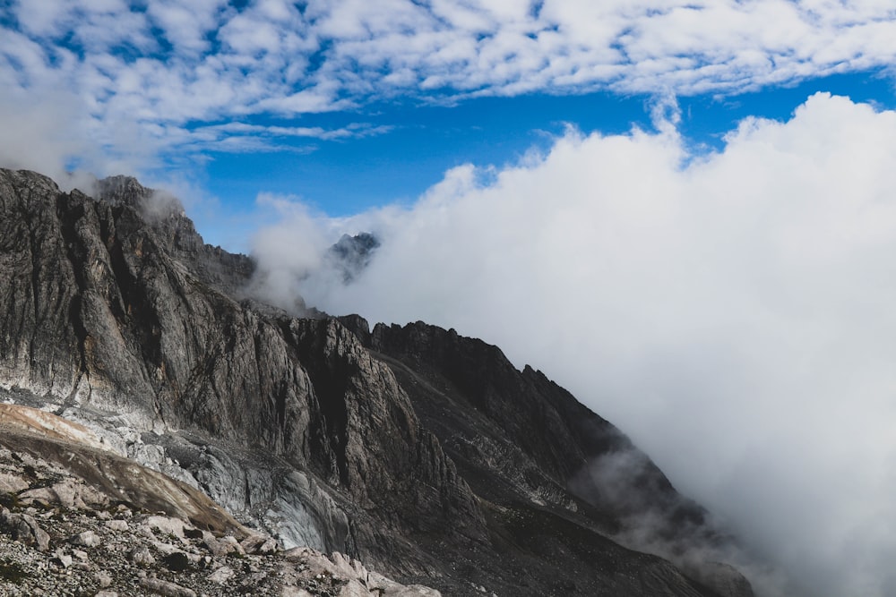 a mountain with clouds