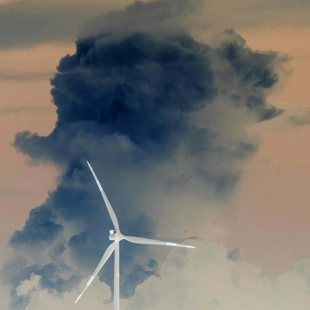 a wind turbine with smoke coming out of it