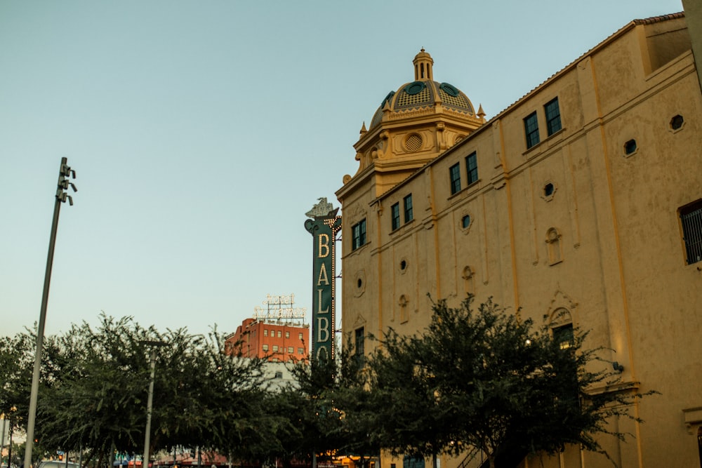 a building with a dome and a clock on it