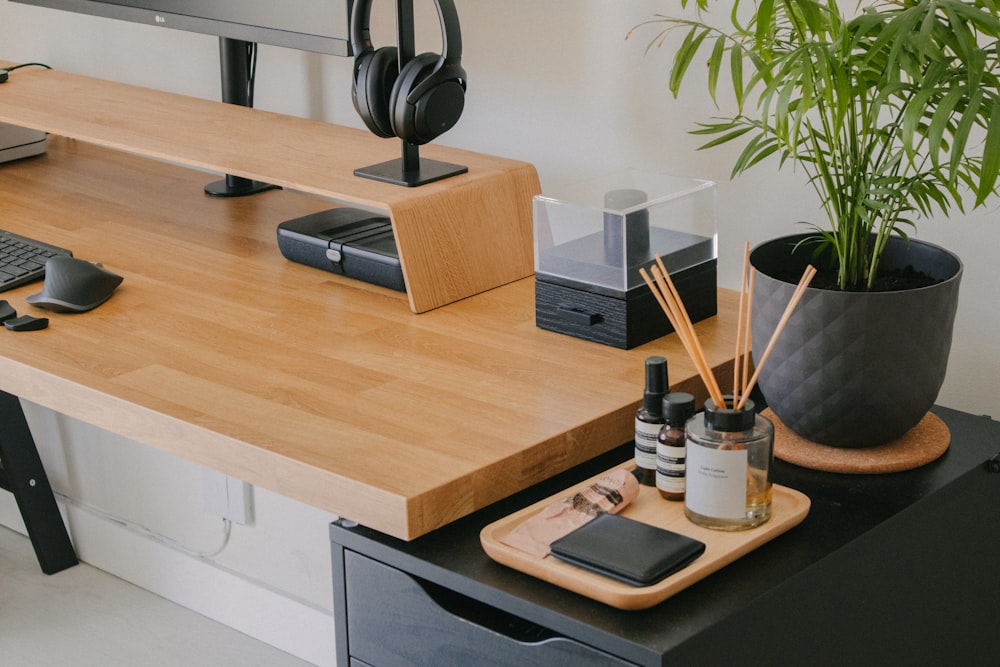 a desk with a phone and other objects on it