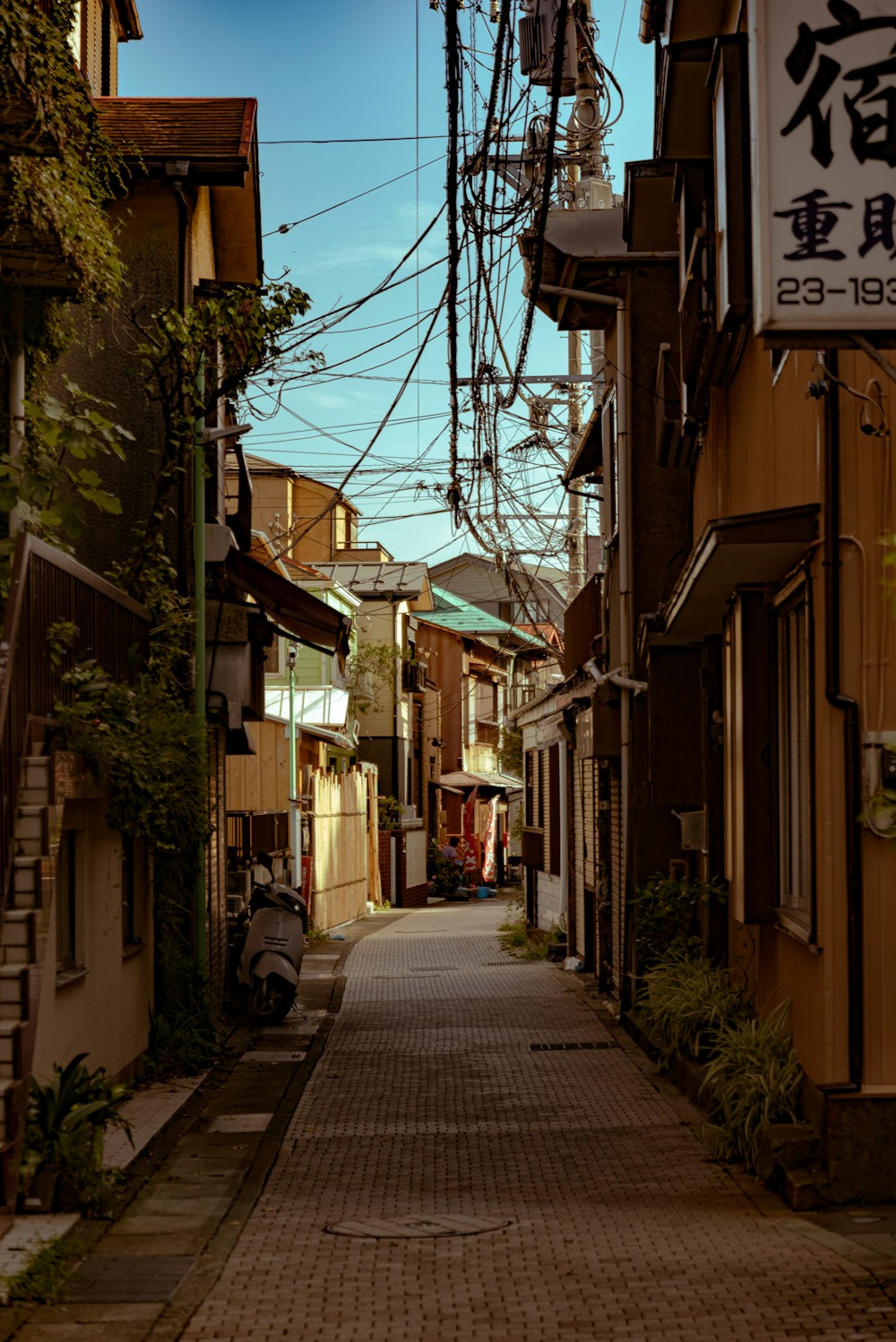 a narrow street with buildings on both sides