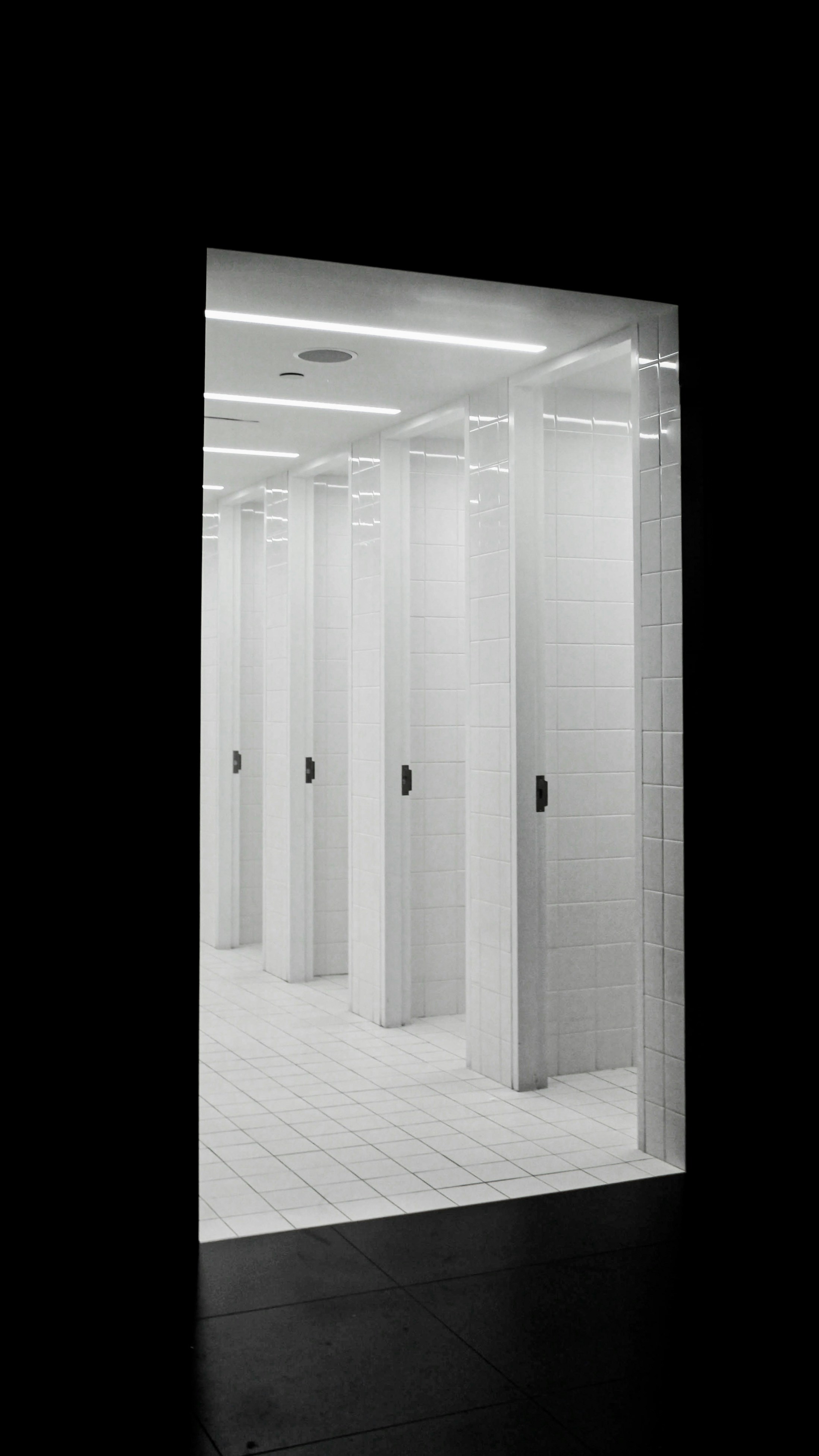 a hallway with white doors