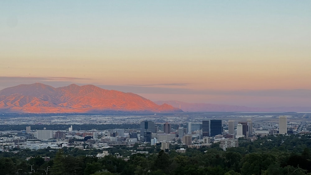 a city with a mountain in the background