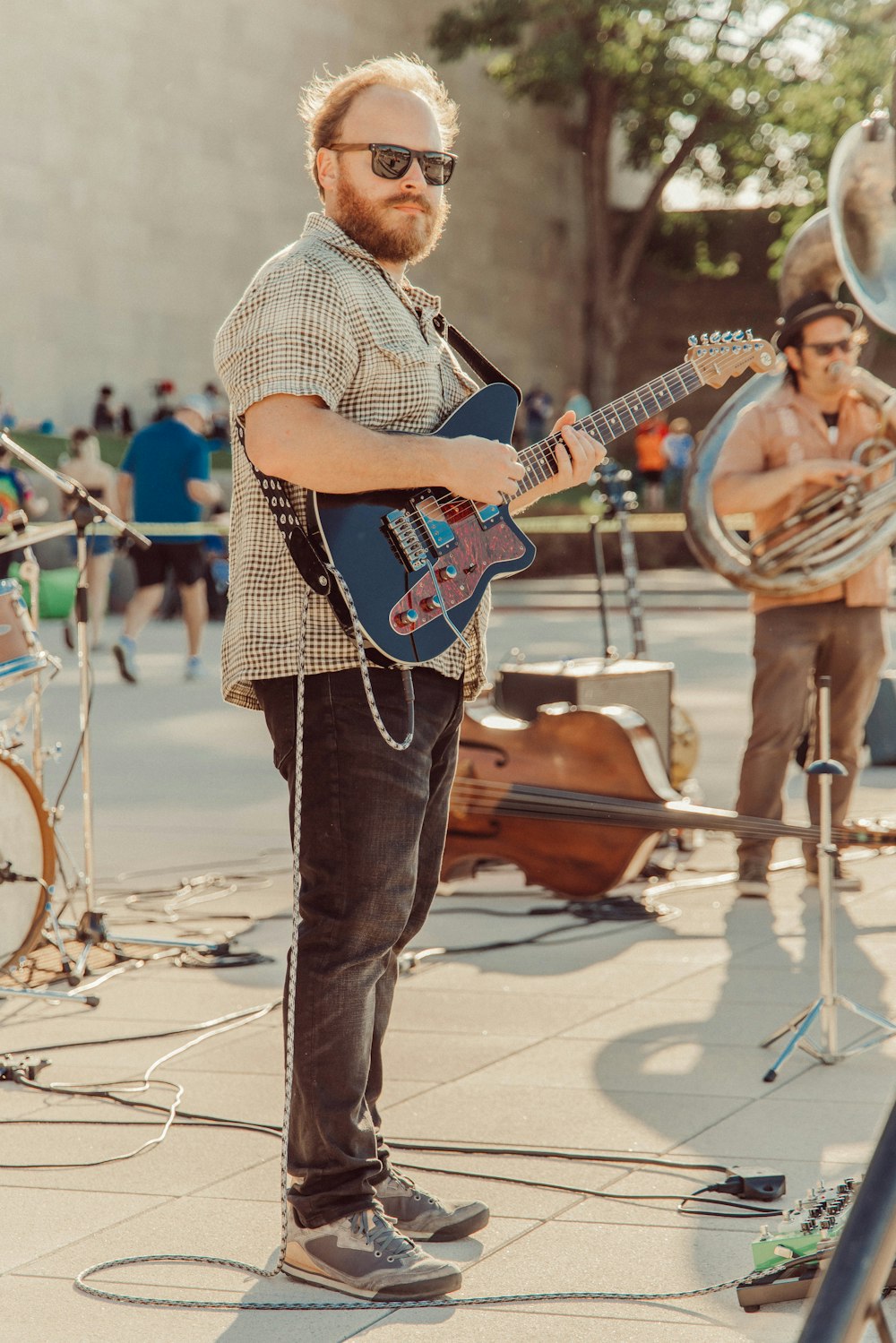 a man playing a guitar