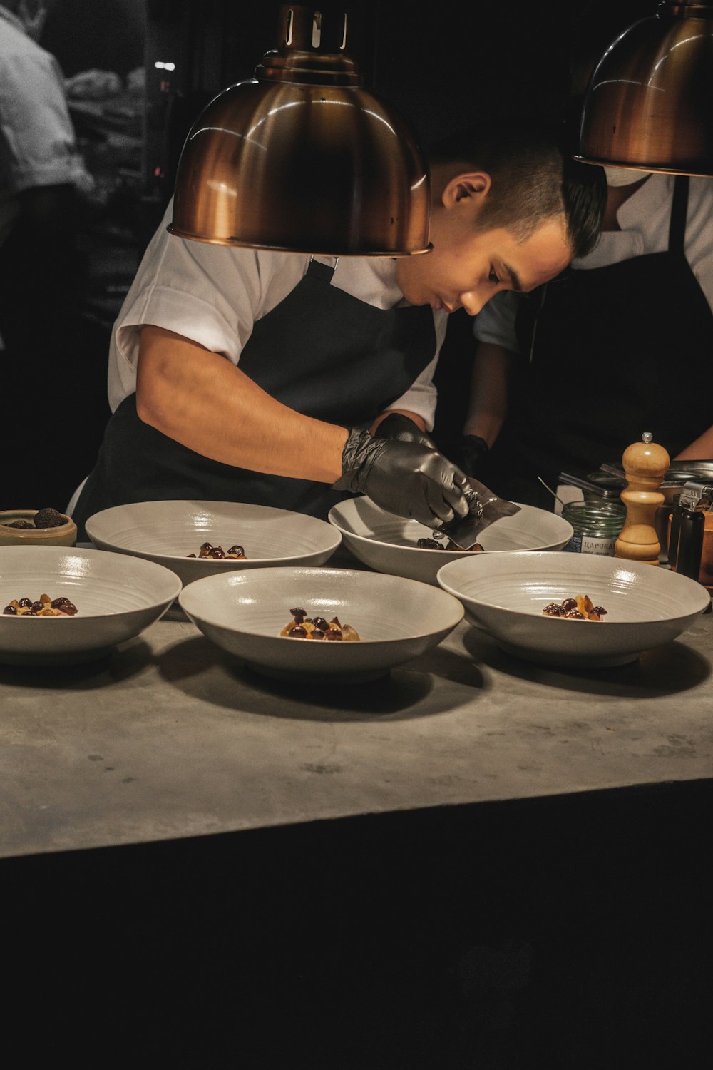 a person cooking food in a kitchen