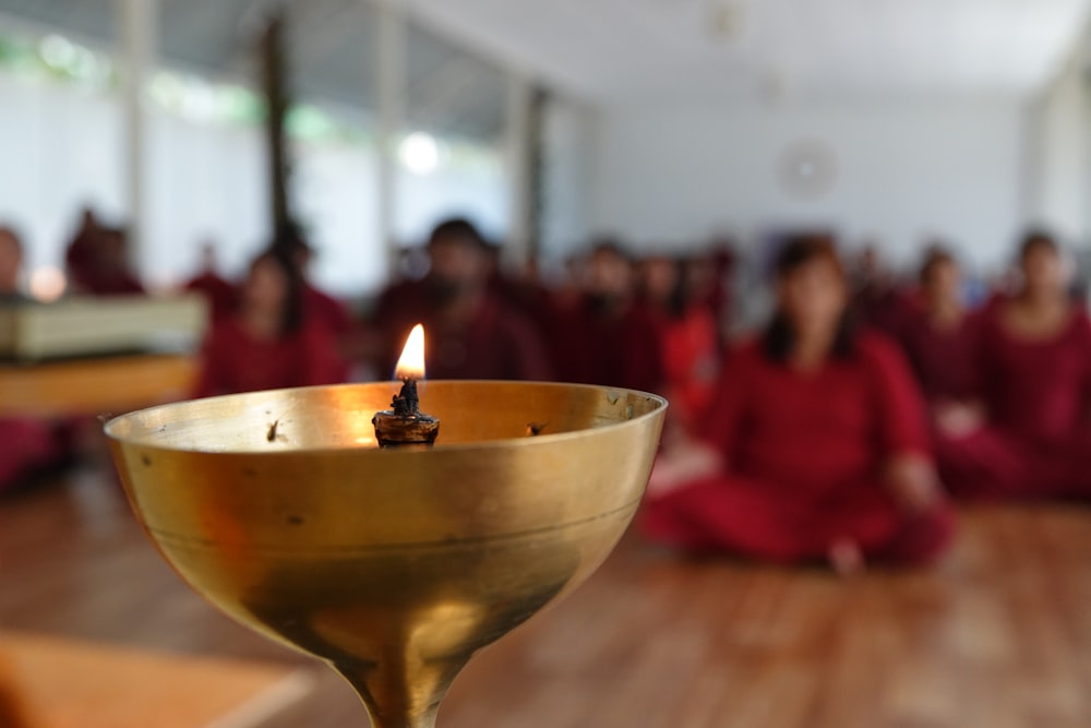 a candle in a bowl