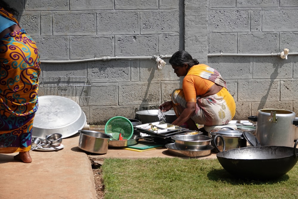 a person cooking food in a kitchen