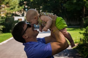 a person holding a baby