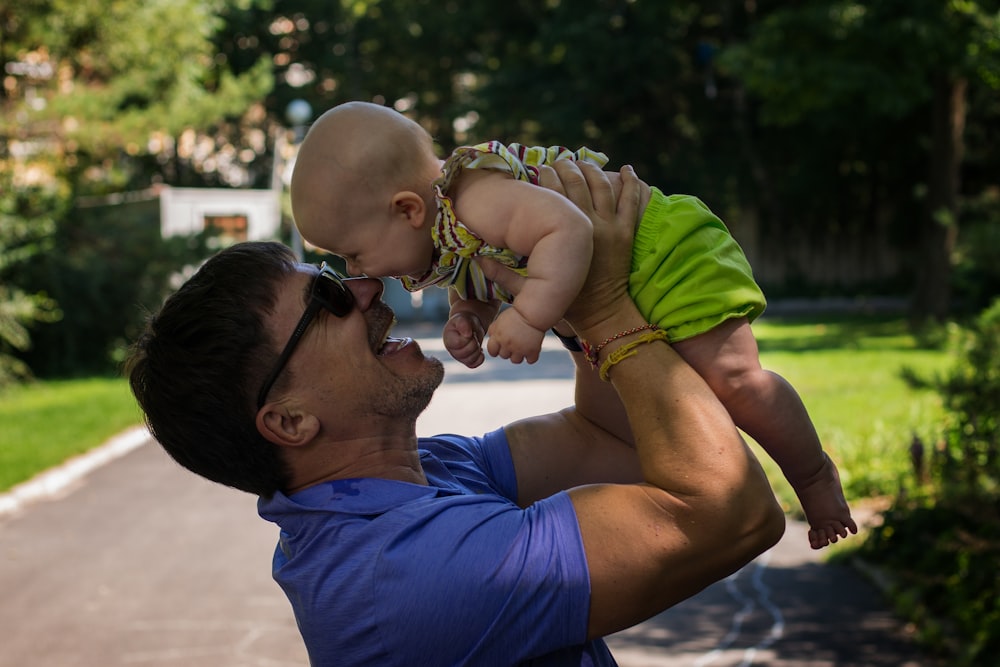 a person holding a baby