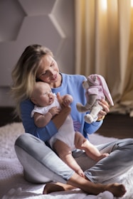 a person holding a baby