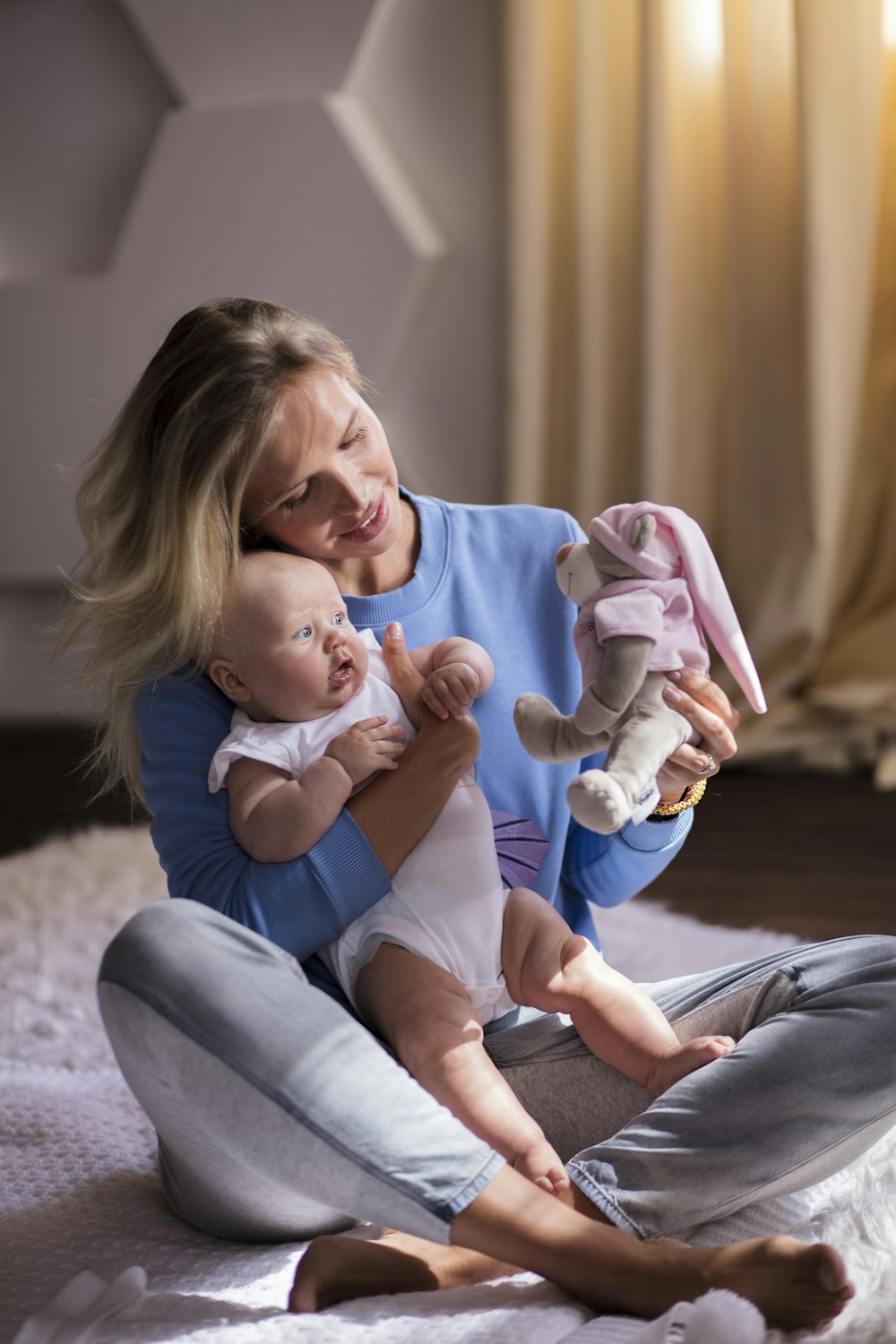 a person holding a baby