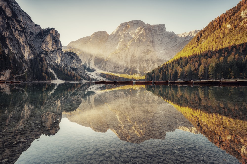 a lake with mountains in the background