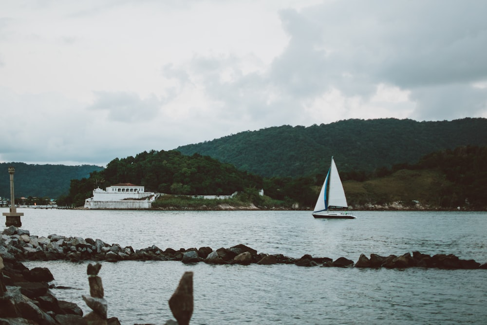 a small boat in a large body of water