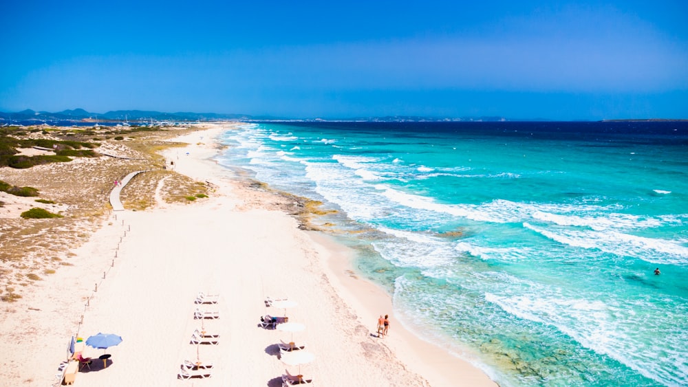 a beach with blue water