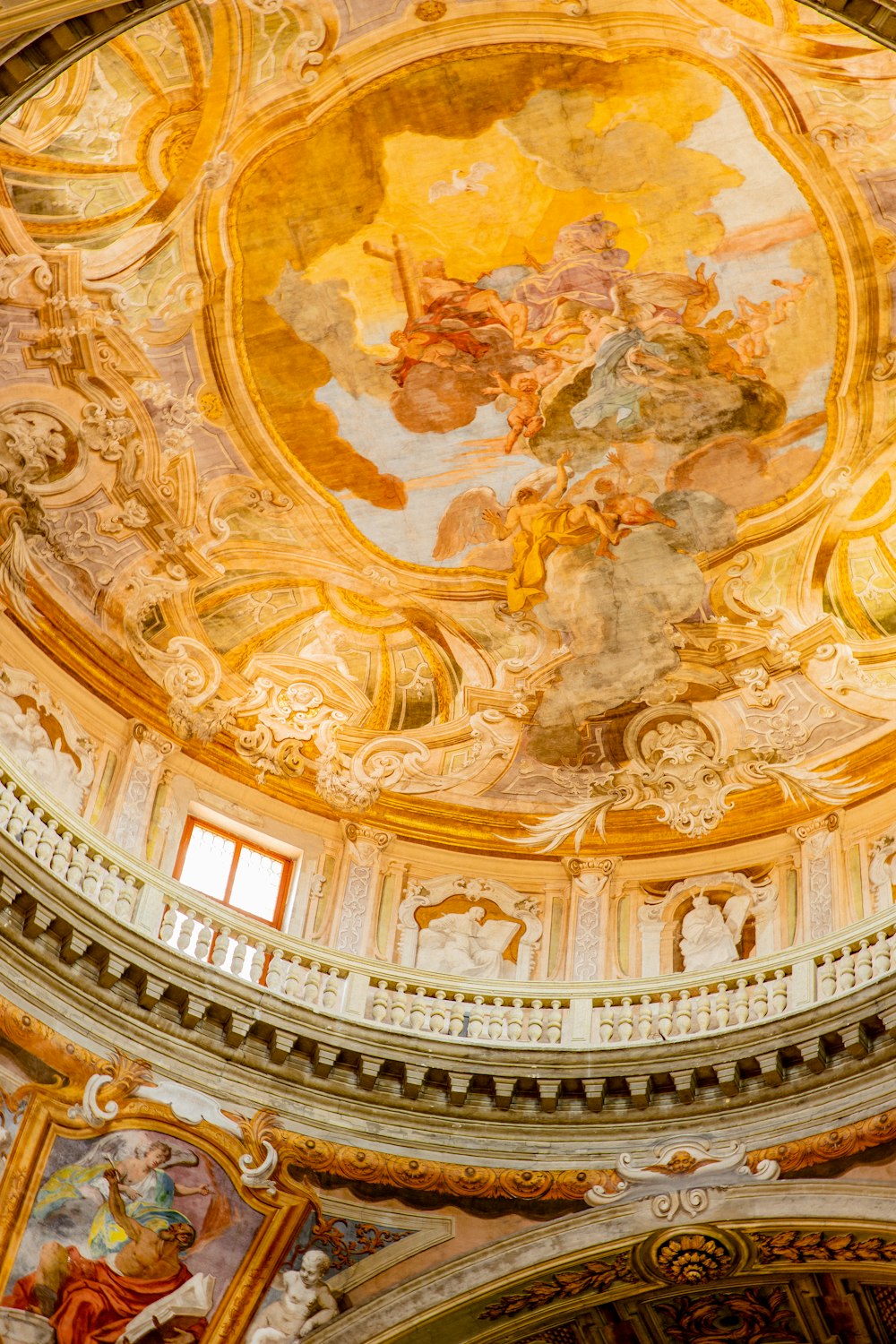 a ceiling with paintings on it