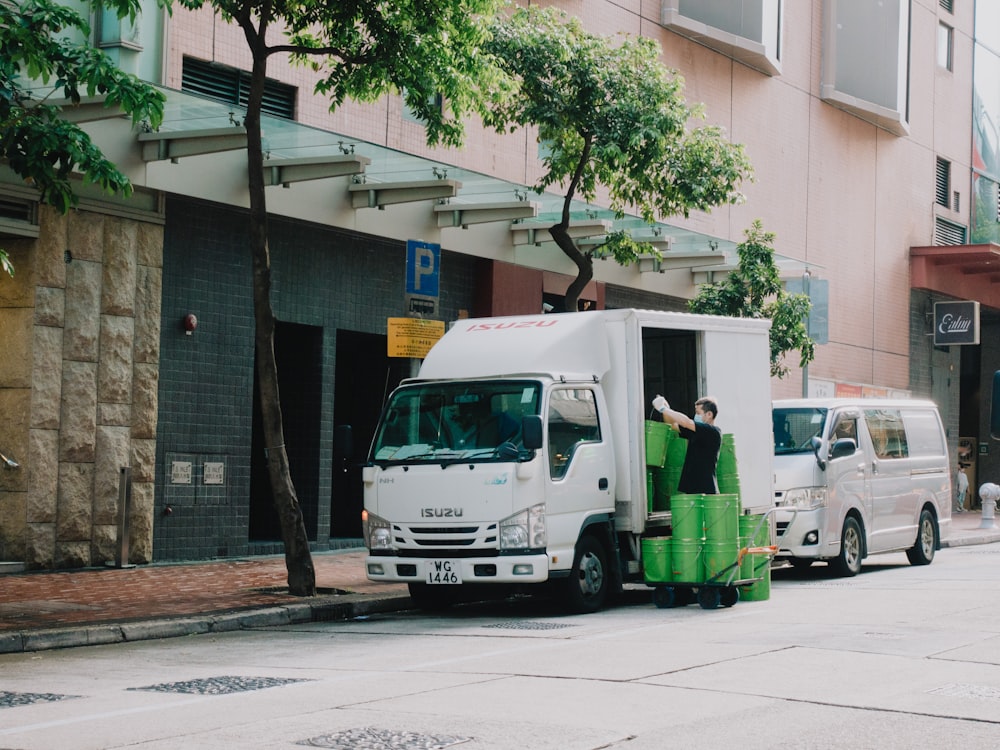 a person getting into a white truck