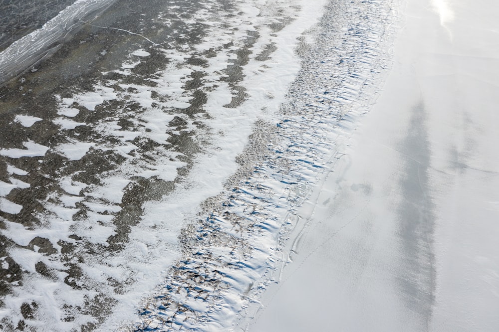 a road with snow on the side