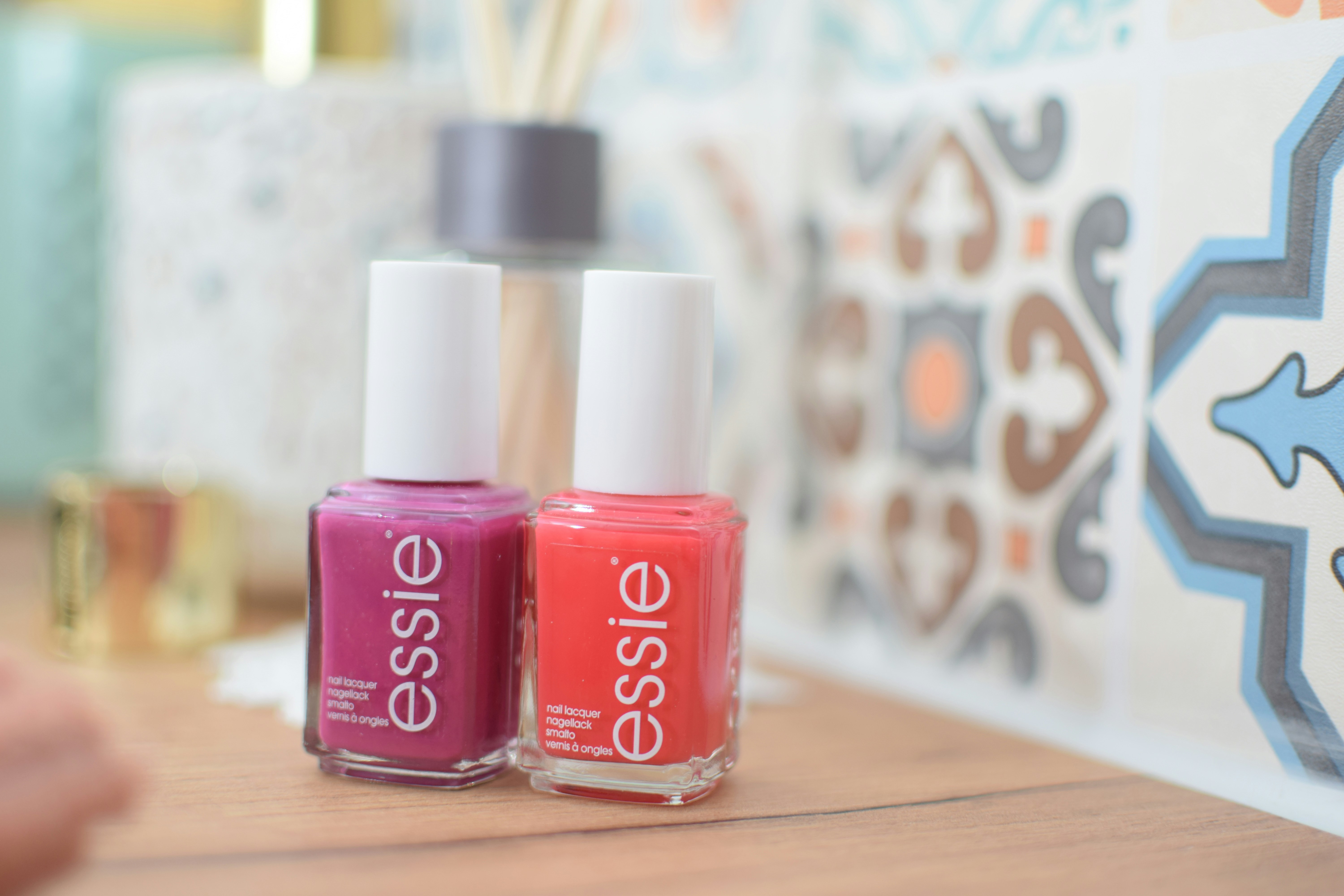 a group of different colored lipsticks