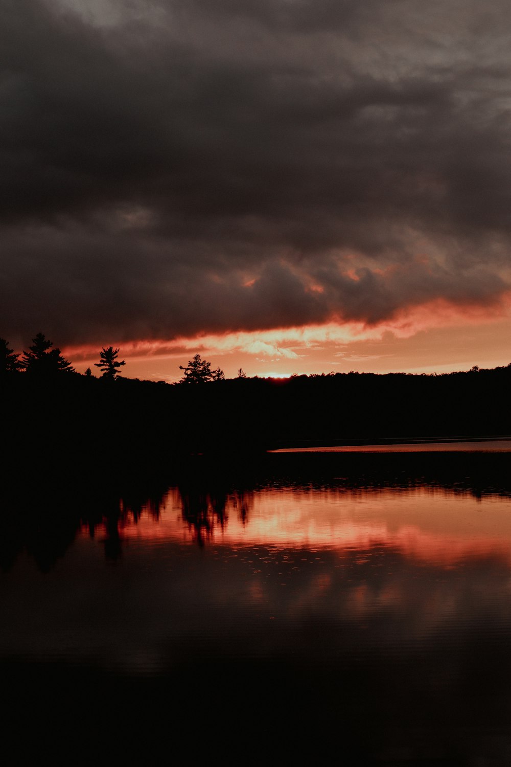 a sunset over a lake