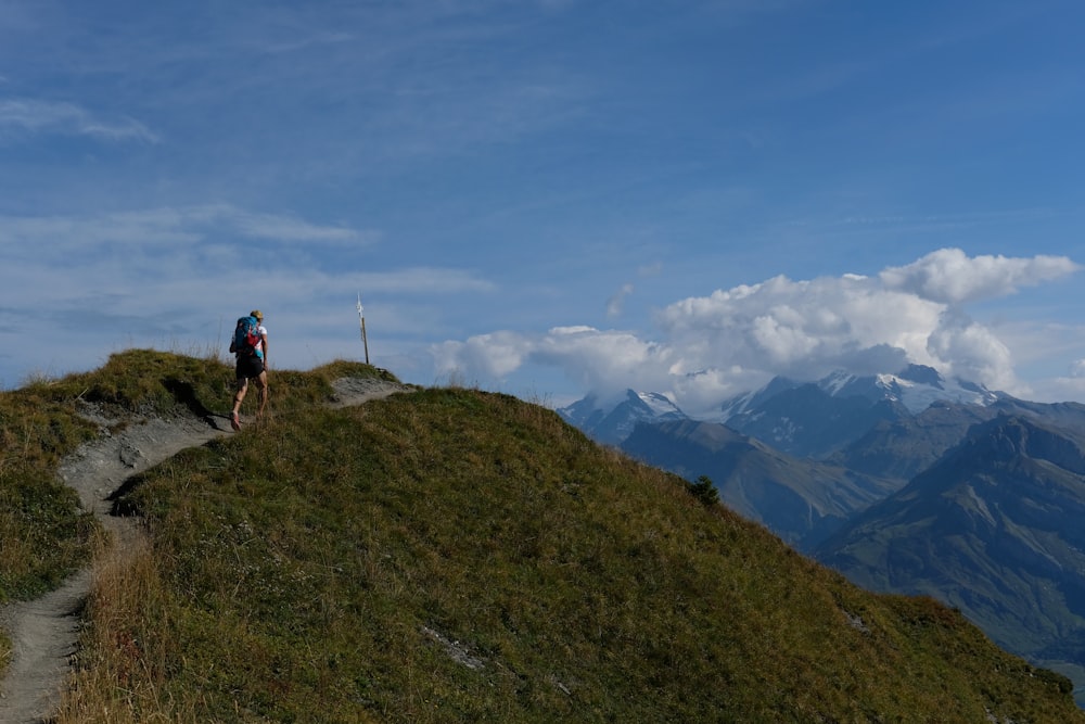 a person hiking on a mountain