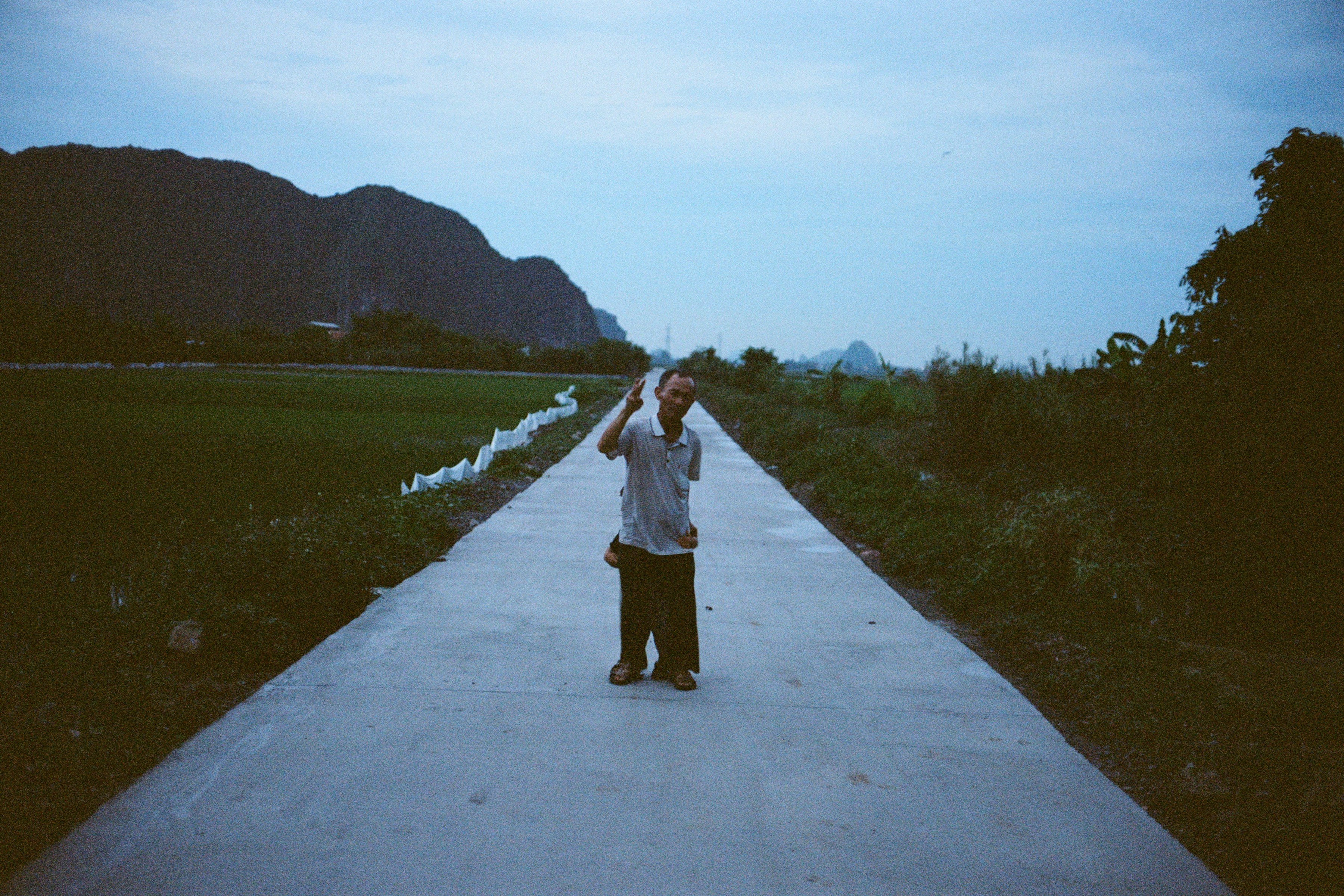 a person standing on a road