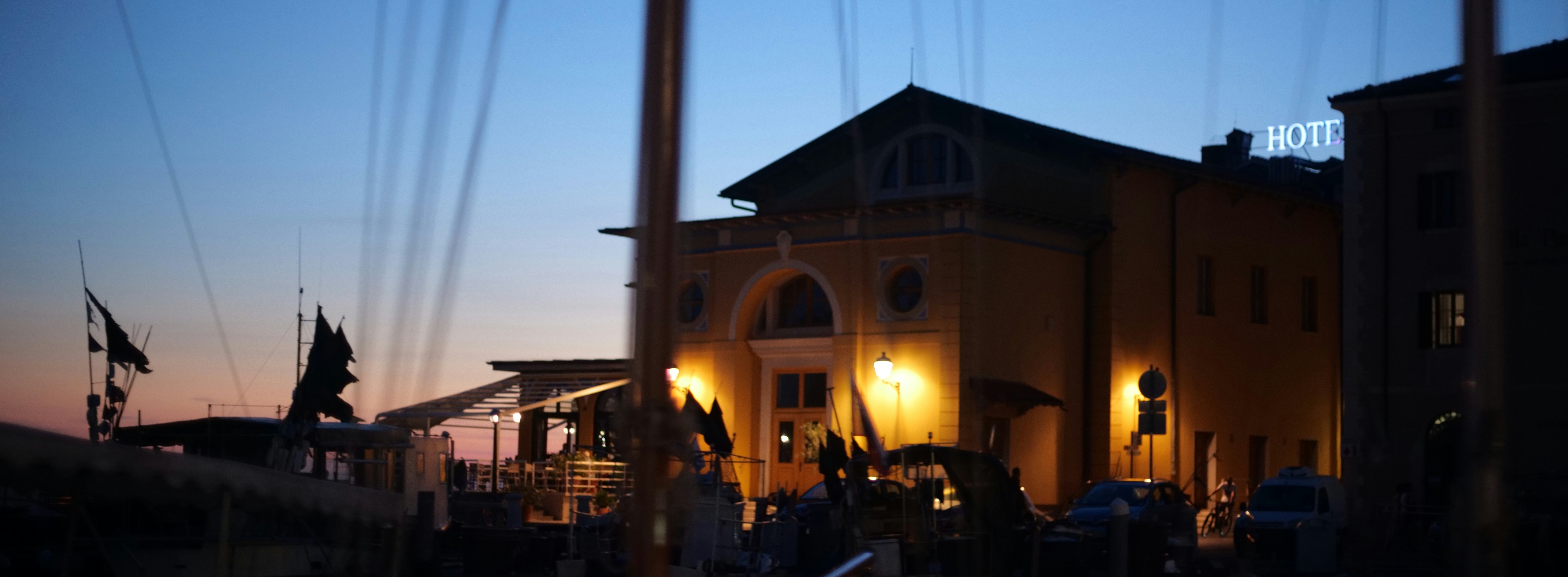 a building with flags in front of it