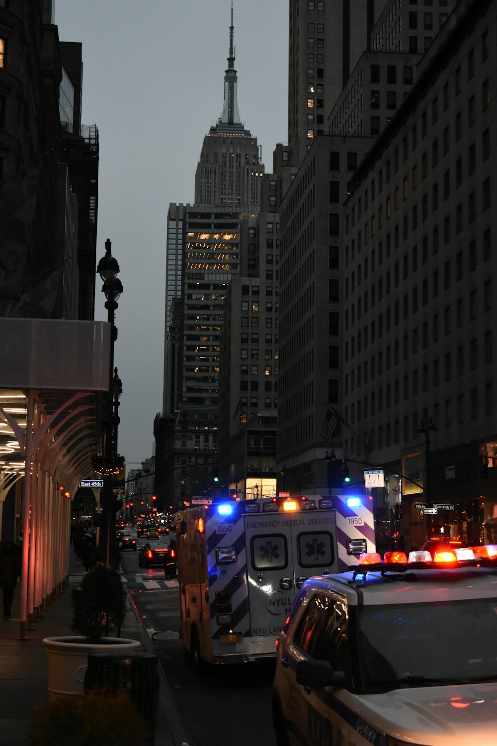 a city street with tall buildings