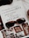 An open magazine displays a page with stylish typography in Portuguese and has a focus on fashion accessories such as sunglasses and jewelry. The sunglasses rest on top of the open page, with additional images showcasing intricate jewelry pieces.
