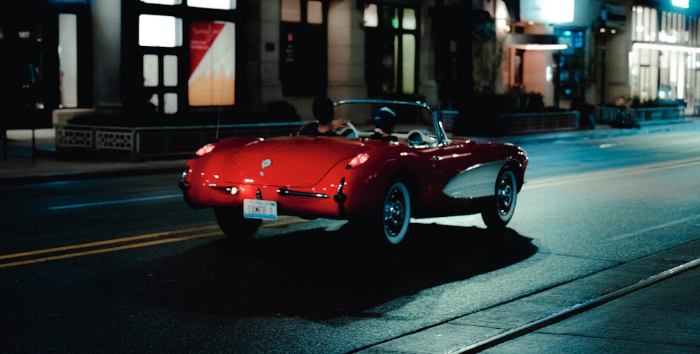 a red sports car on a street
