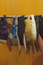 a group of clothes on a rack