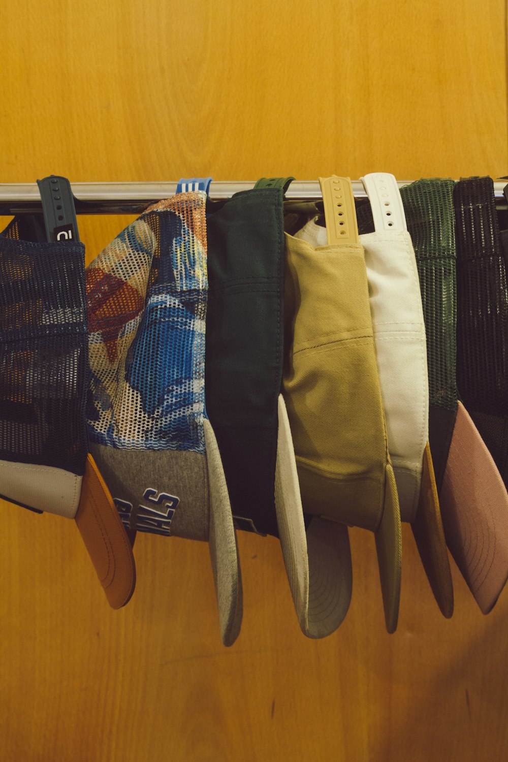 a group of clothes on a rack