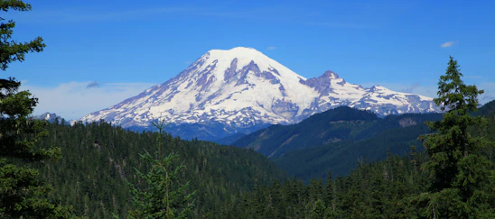 A majestic view of Mount Olympus shrouded in crystal-clear, fresh air, symbolizing purity and tranquility.