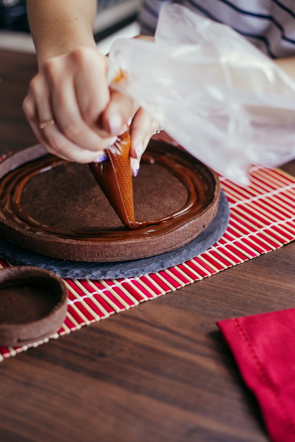 a hand holding a brown object